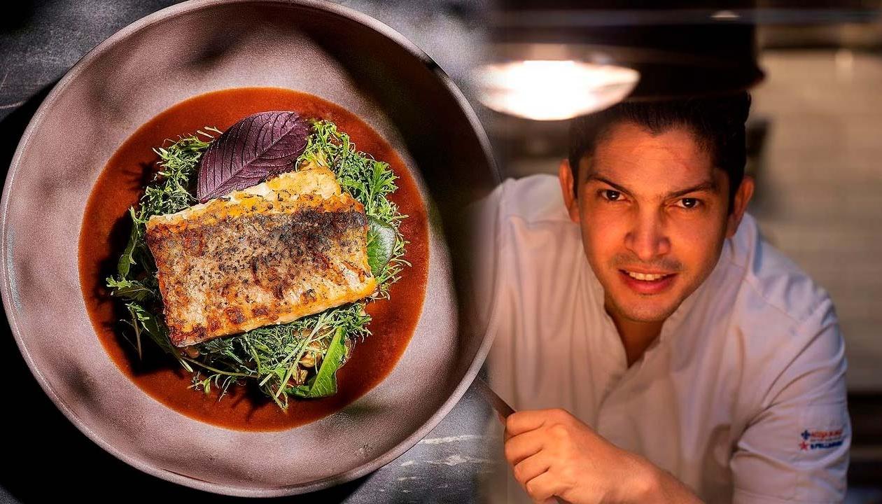El reconocido chef Manuel Mendoza junto a una de sus recetas: pesca al carbón, mantequilla picante de ají chivato, ensalada tibia de fríjol cabecita negra y demiglace de pescado