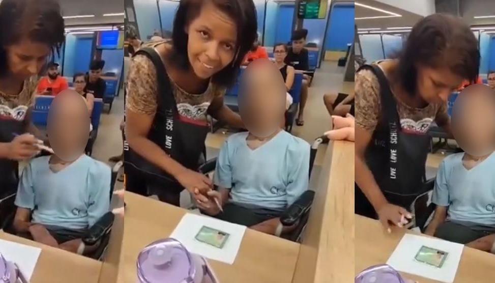 Momento en que la mujer simulaba que su tío estaba vivo para firmar el documento del préstamo. 