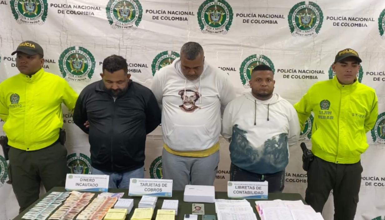 Los tres capturados por la Policía. 