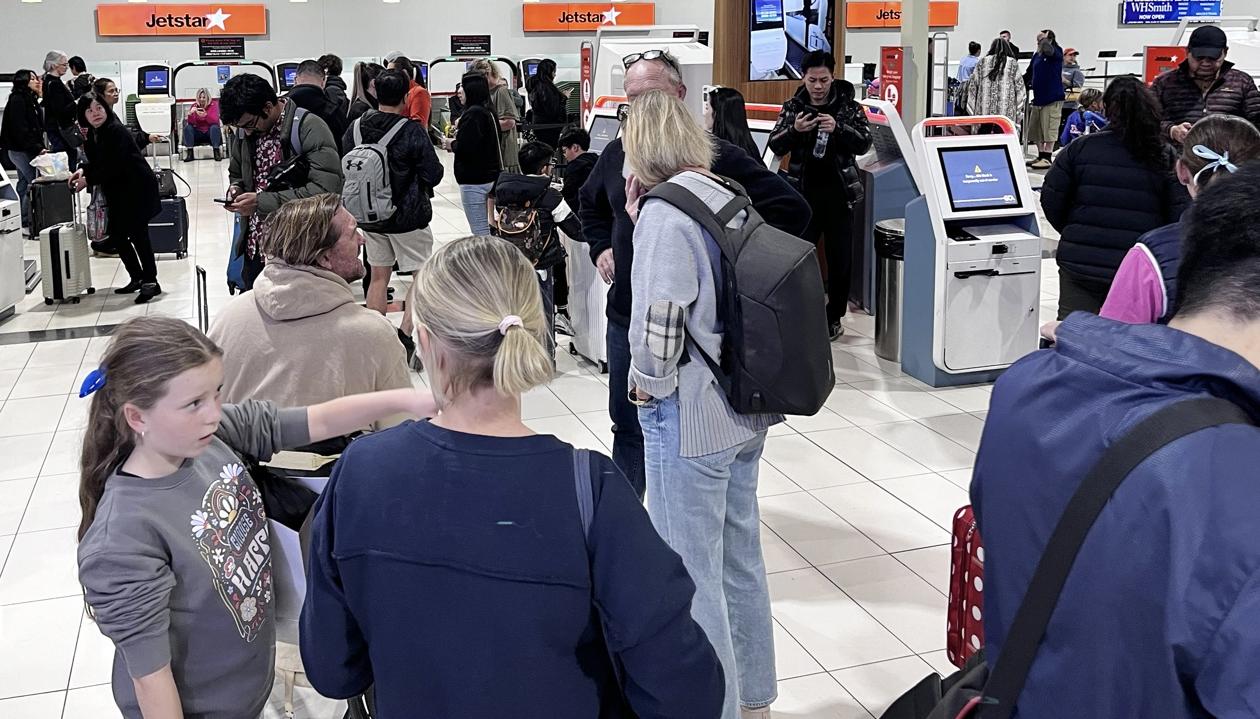 Pasajeros de al aerolínea Jetstar en el aeropuerto de Gold Coast in Bilinga.