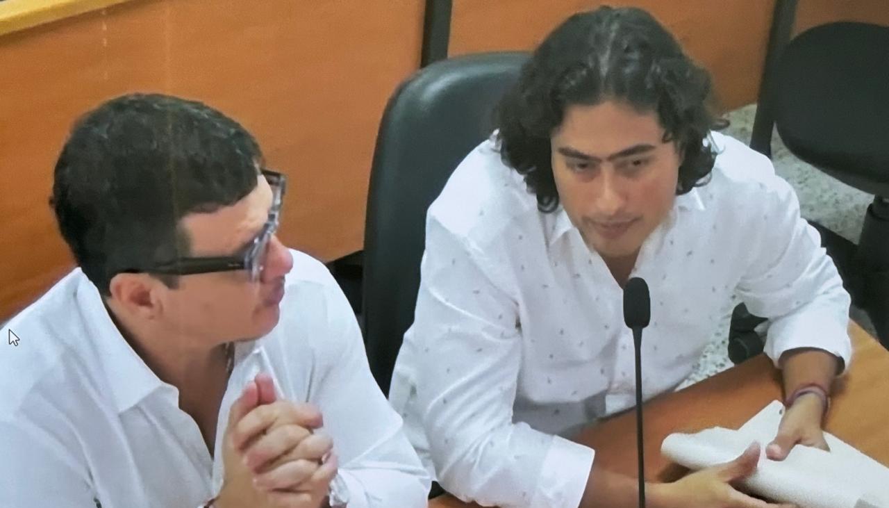 Abogado Diego Henao y Nicolás Petro, hoy en audiencia.