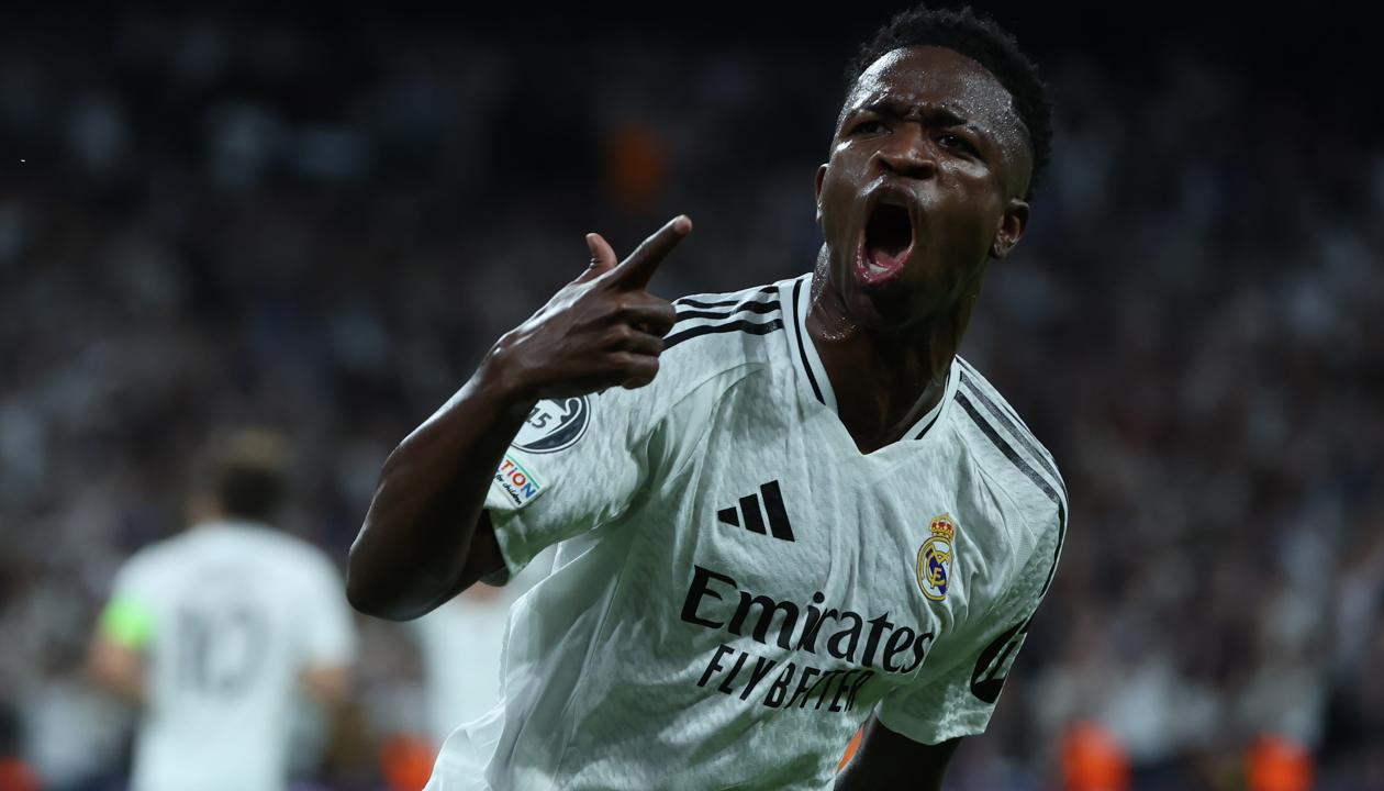 El brasileño Vinicius Junior festeja uno de sus goles ante el Dortmund.