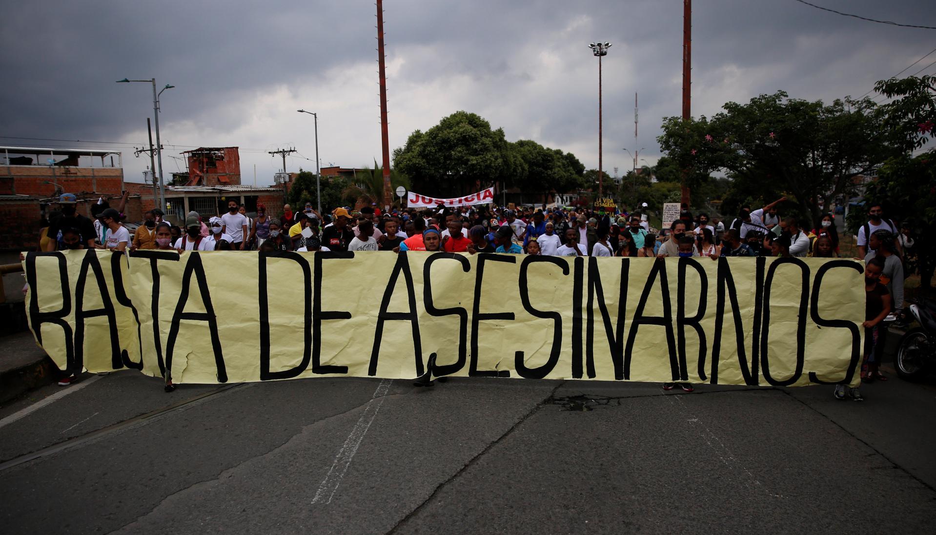 Manifestación exigiendo justicia por la masacre de cinco menores de edad en agosto de 2020, en Cali. 