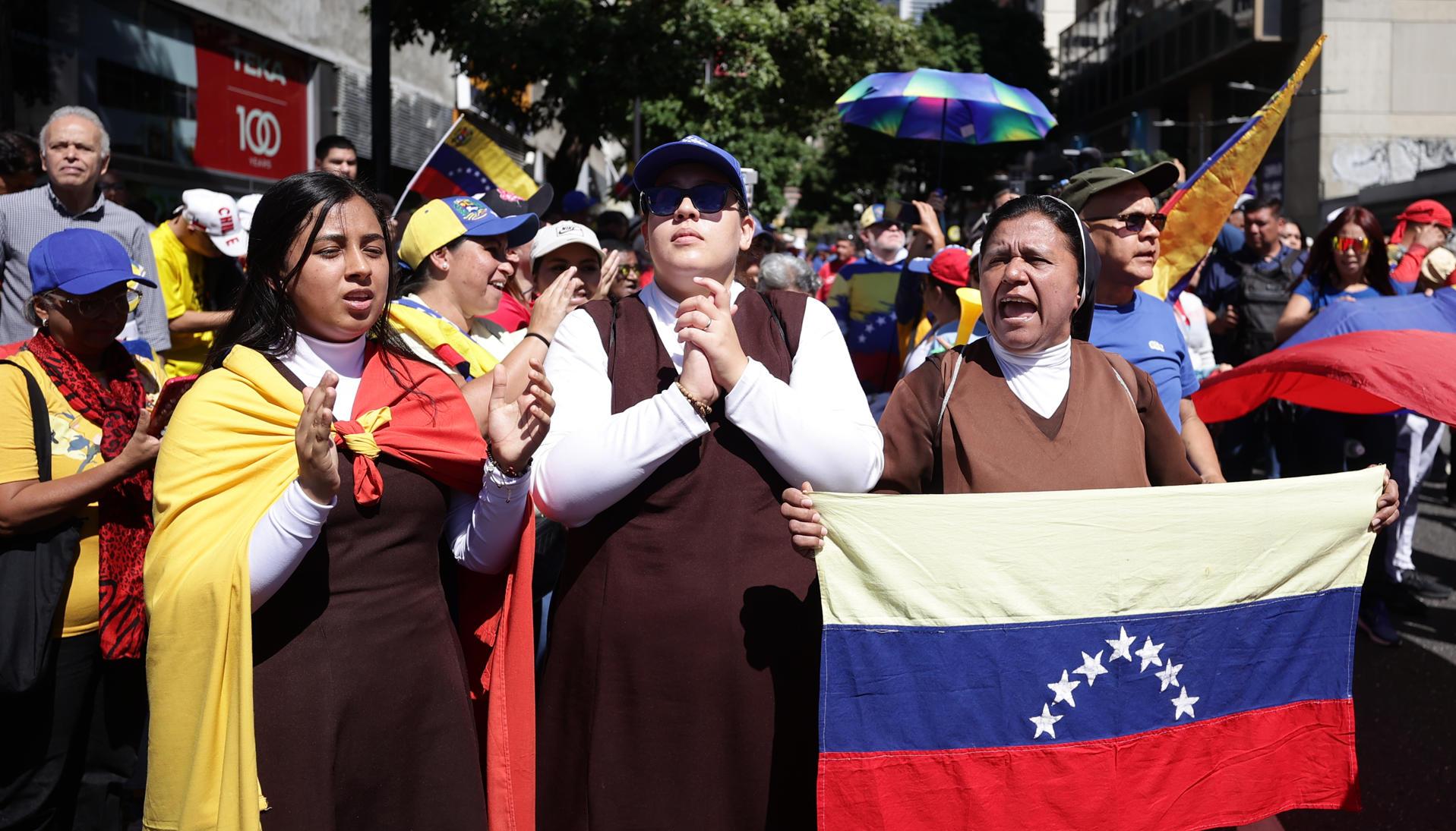 Venezolanos opositores en una manifestación, en Caracas.