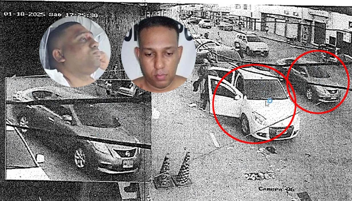 Taxi parqueado en la carrera 38 antes que se bajara el sicario y el momento en que pasa el vehículo donde se transportaba los hermanos Frías Castillo (caras). 