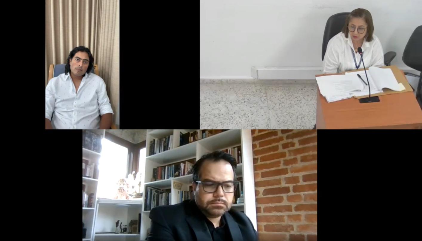 Nicolás Petro, su abogado y la delegada de la Procuraduría.