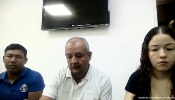 Los tres imputados durante las audiencias preliminares. 