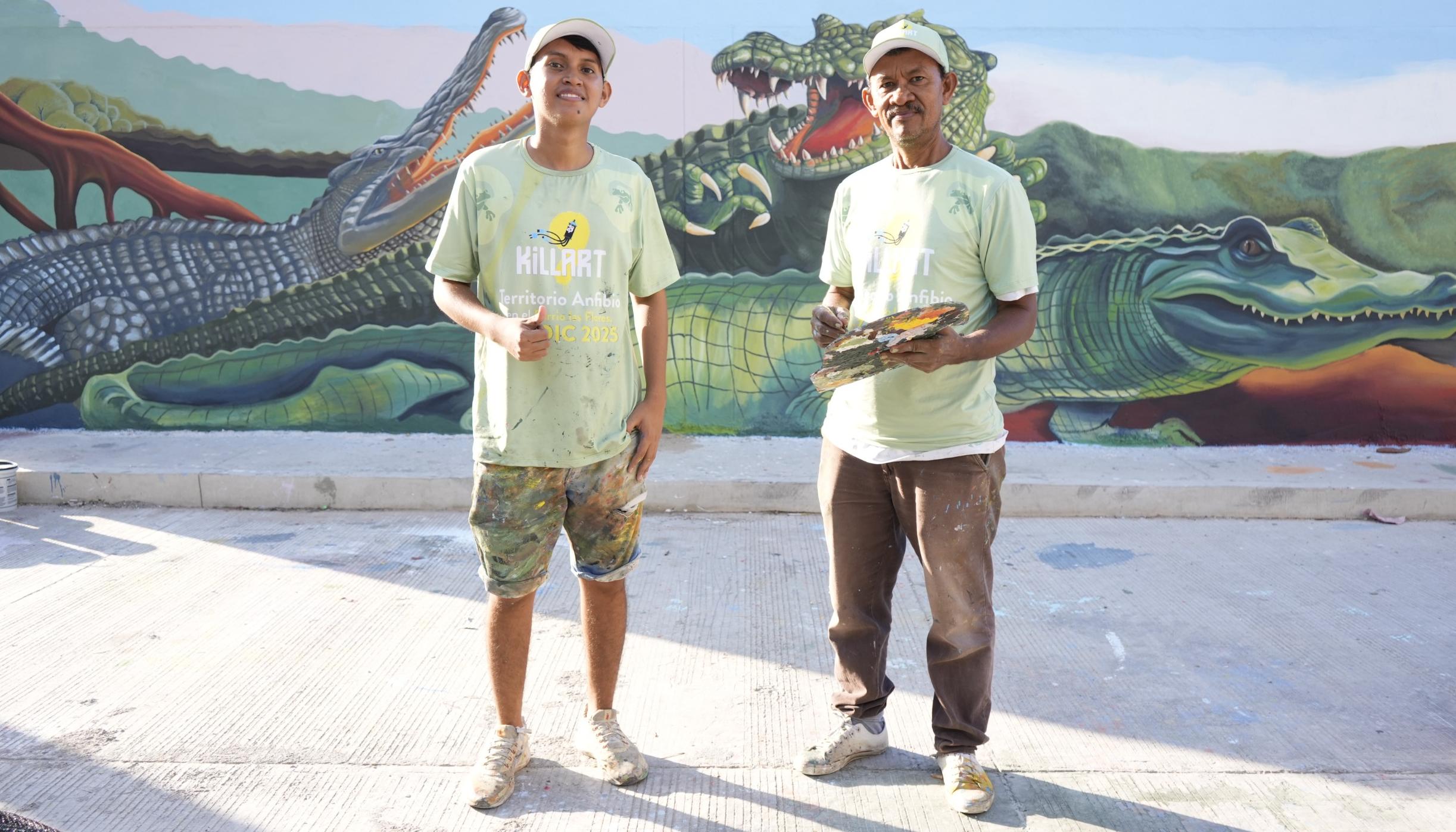 Padre hijo, artistas del barrio Las Flores. 