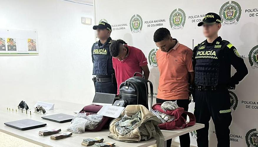 Dos de los capturados por parte de la Policía. 