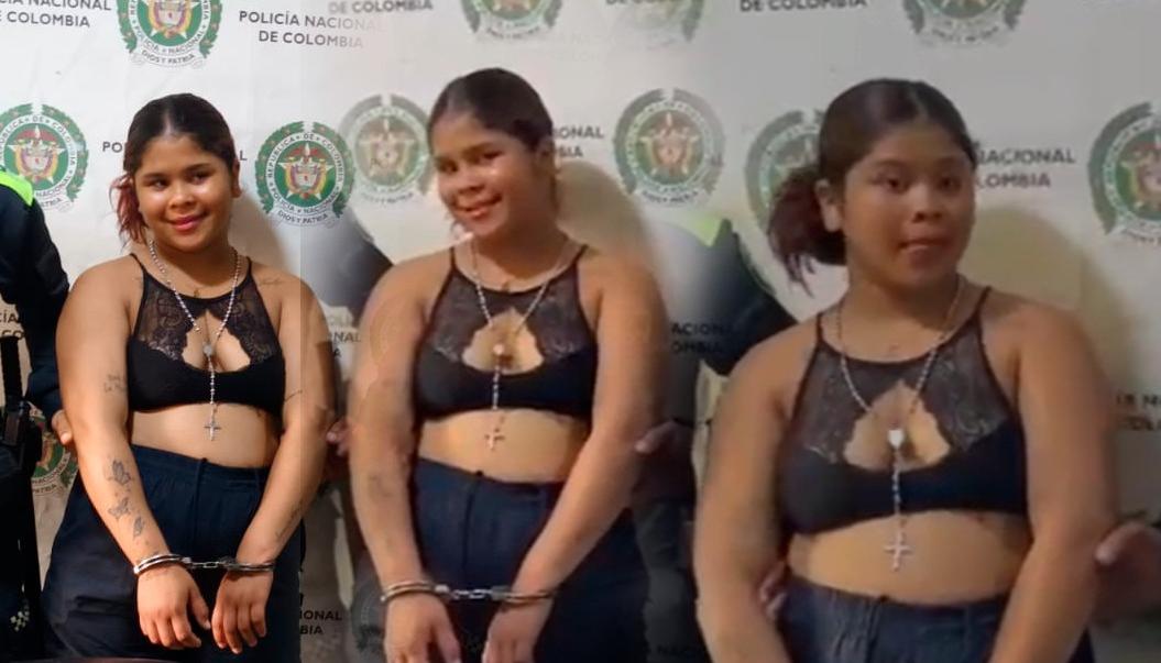 La mujer posando tras ser capturada por la Policía. 