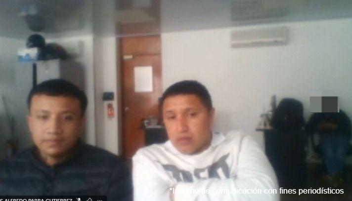 Los dos imputados durante las audiencias preliminares. 