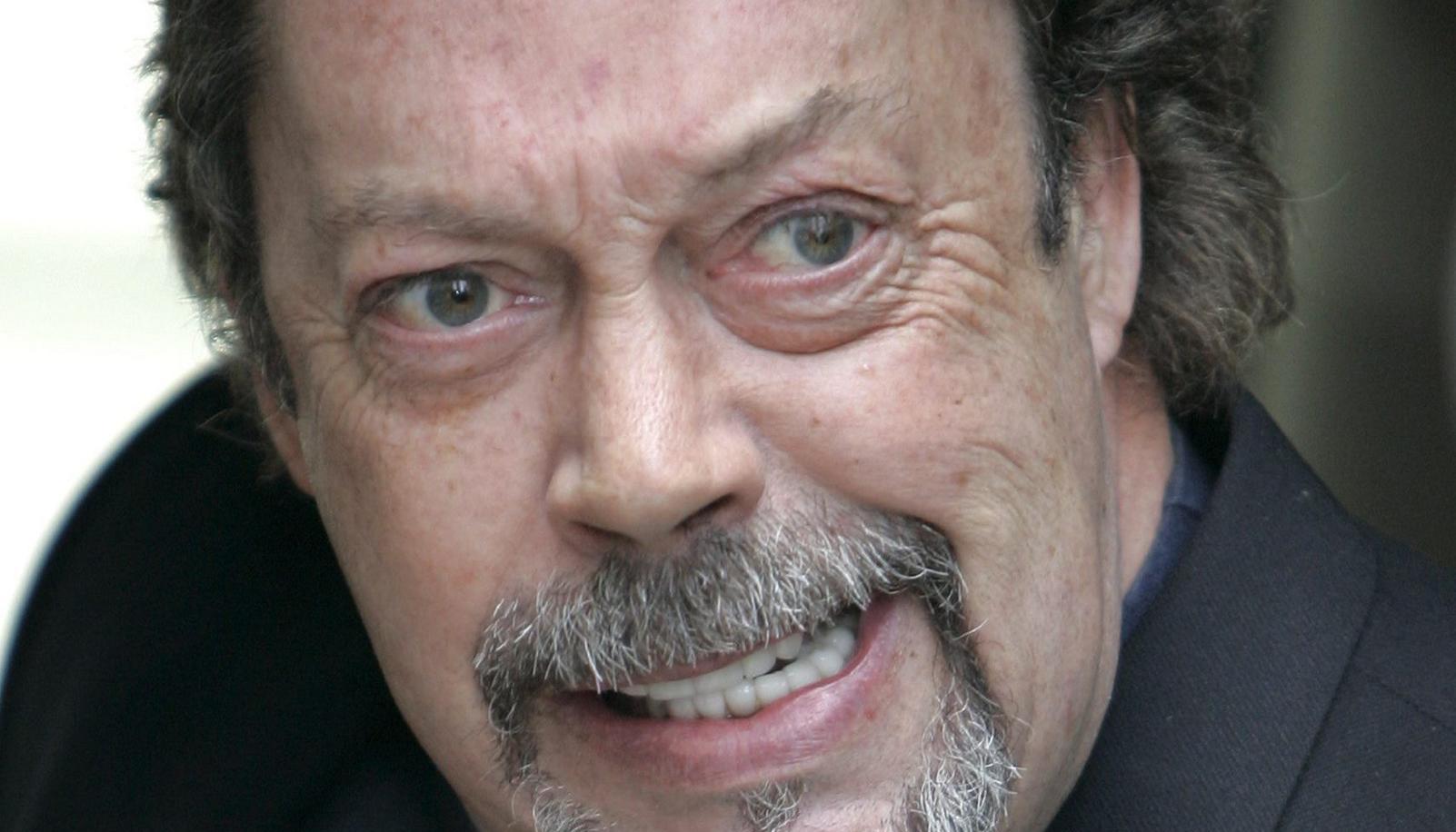 Tim Curry.