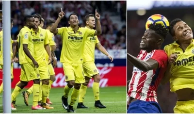  El centrocampista ghanés del Atlético de Madrid, Thomas Partey (i), disputa un balón ante el delantero colombiano del Villarreal, Carlos Bacca.