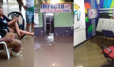 Los habitantes se han instalado afuera de sus casas en medio del agua.