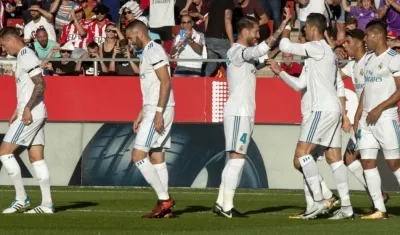 Jugadores del Real Madrid celebran tras un gol. 