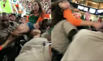  Un policía de Miami Dade golpea a una mujer en la cara