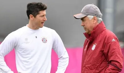 Robert Lewandowski  y Carlo Ancelotti.