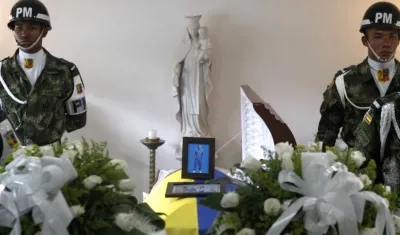 Imagen de la velación del pesista colombiano vinculado a las FFMM.