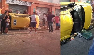 Así quedó el taxi volcado en el centro de Barranquilla.