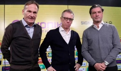 Hans-Joachim Watzke, Peter Stoeger y Michael Zorc.