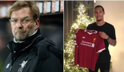 El alemán Jürgen Klopp y el defensa Virgil Van Dijk.