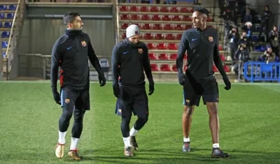 Luis Suárez, Lionel Messi y Yerry Mina. 