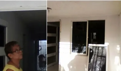 Una de las afectadas muestra los daños en su vivienda.