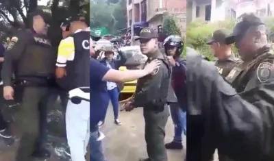 Policías capturados en Medellín. 