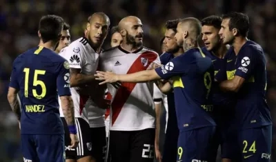 Jugadores de Boca y River. 