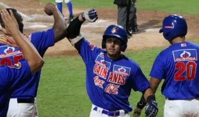 Carlos Vidal celebra tras su cuadrangular. 