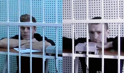 Alexandr Kokorin (Zenit) y Pável Mamáev (Krasnodar), tras las rejas. 