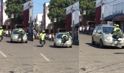 Aferrado en el capó el patrullero logró salvarse pese a que la conductora continuaba su marcha.