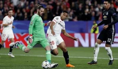 Luis Fernando Muriel y David De Gea. 