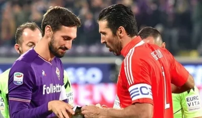 Davide Astori y Gianluigi Buffon.