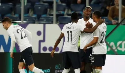 Los jugadores de Francia celebrando el tercer gol. 