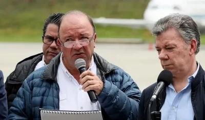 El ministro de Defensa, Luis Carlos Villegas junto al Presidente Santos.