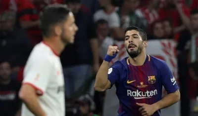 Luis Suárez anotó dos goles en el triunfo. 