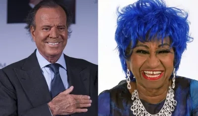 Los cantantes Julio Iglesias y Celia Cruz.