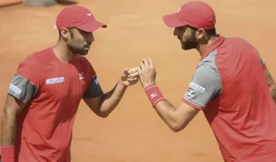 Juan Cabal y Robert Farah, tenistas colombianos. 