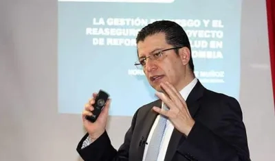Exsuperintendente Nacional de Salud, Norman Julio Muñoz Muñoz