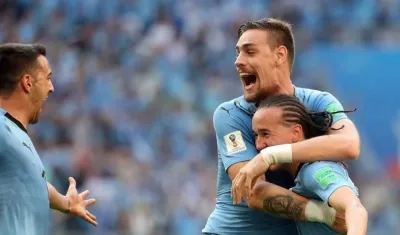 Uruguay logró clasificación a octavos del final con 9 puntos.