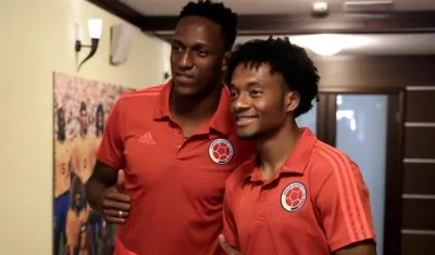 Yerry Mina y Juan Guillermo Cuadrado. 