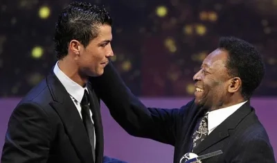Cristiano, en una foto de 2014, con Pelé.