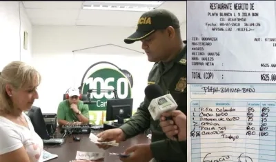 Un policía devuelve el dinero cobrado de más por un restaurante en Cartagena.