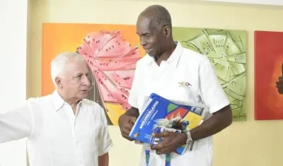 A la izquierda Baltazar Medina presidente del COC y Ruperto Herrera, secretario del Comité Olímpico de Cuba.