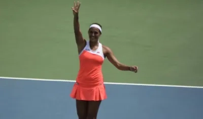 Mónica Puig festejando su triunfo. 