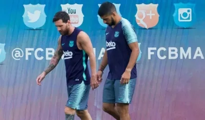 Lionel Messi y Luis Suárez. 