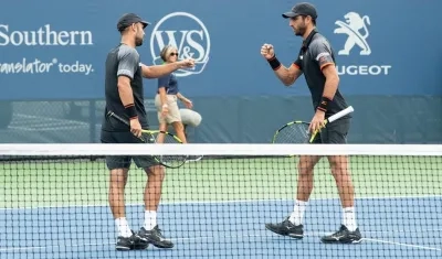 Juan Cabal y Robert Farah. 