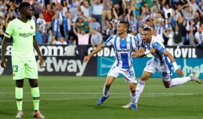 El centrocampista del Leganés, Oscar Rodríguez (c) celebra el segundo gol de su equipo.