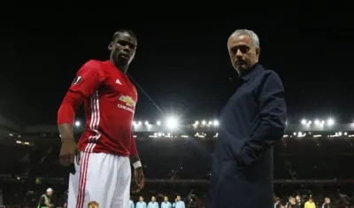 Paul Pogba y José Mourinho. 